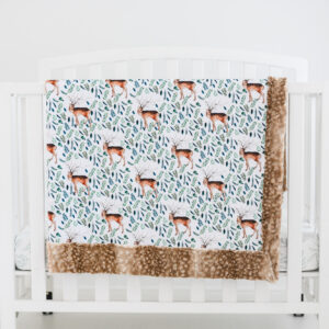 Farmhouse deer blanket hanging on crib
